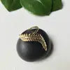 BR136 / Brass Draped Leaf Ring