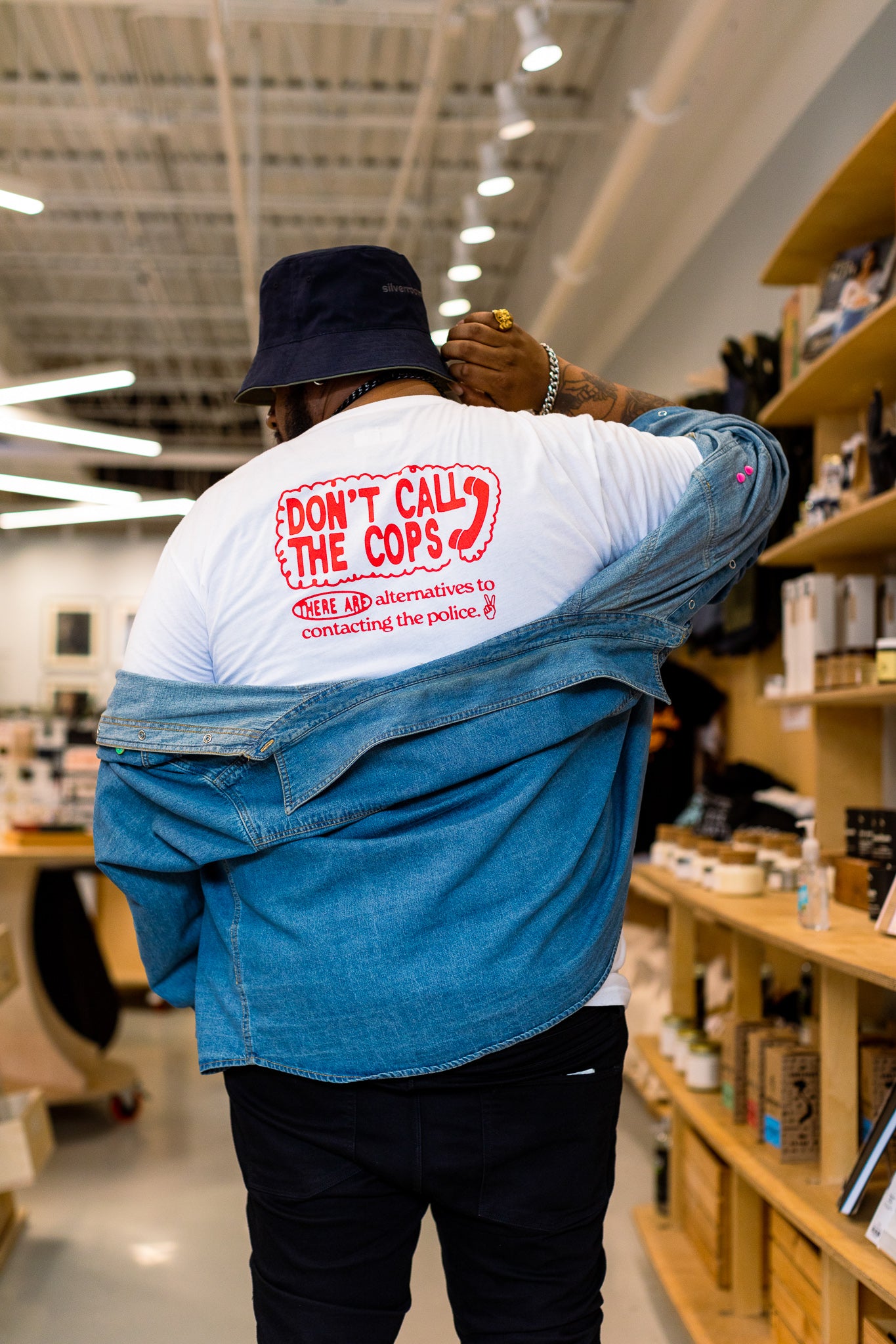 COMMUNITY CARE T-SHIRT