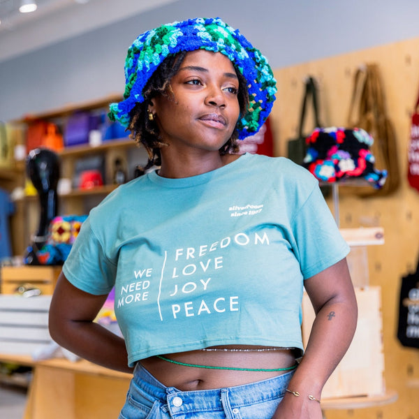 The Silverroom |We Need More Freedom, Love, Joy, Peace Women’s Tee - Green